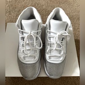 Women’s Metalic Silver Jordan retro 11. In great condition only worn few times